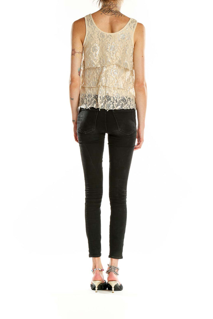Back view of cream lace tiered tank top showing full length