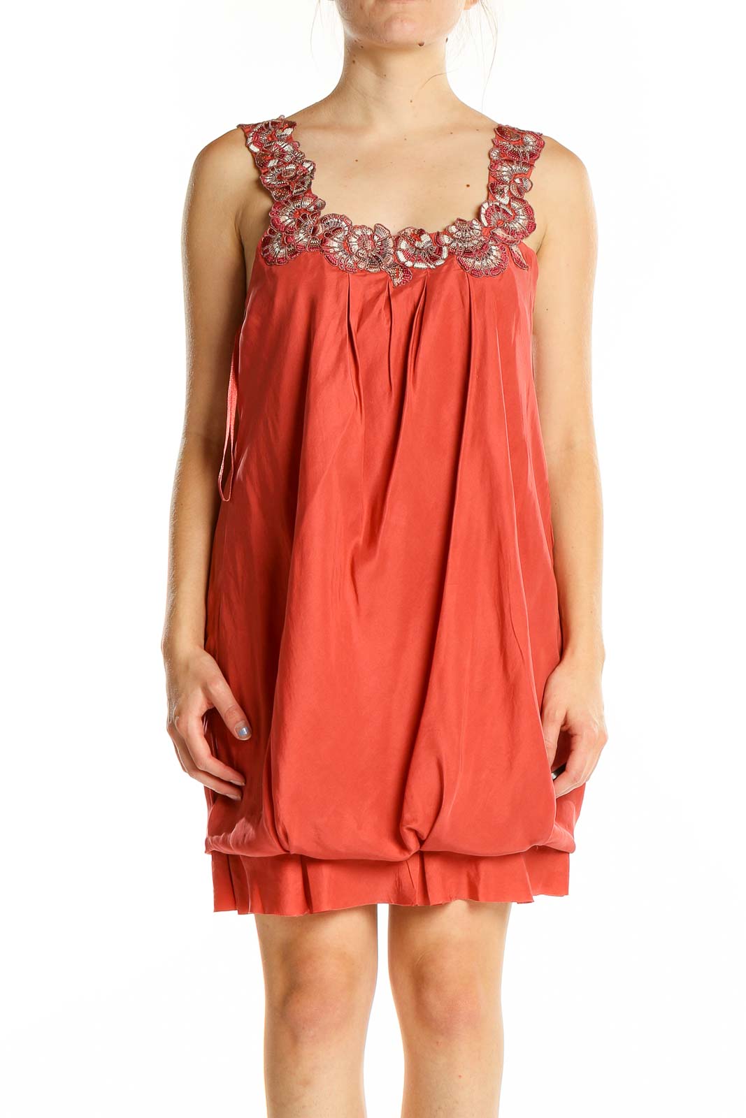 Front view of coral BCBG MaxAzria bubble dress with embellished neckline