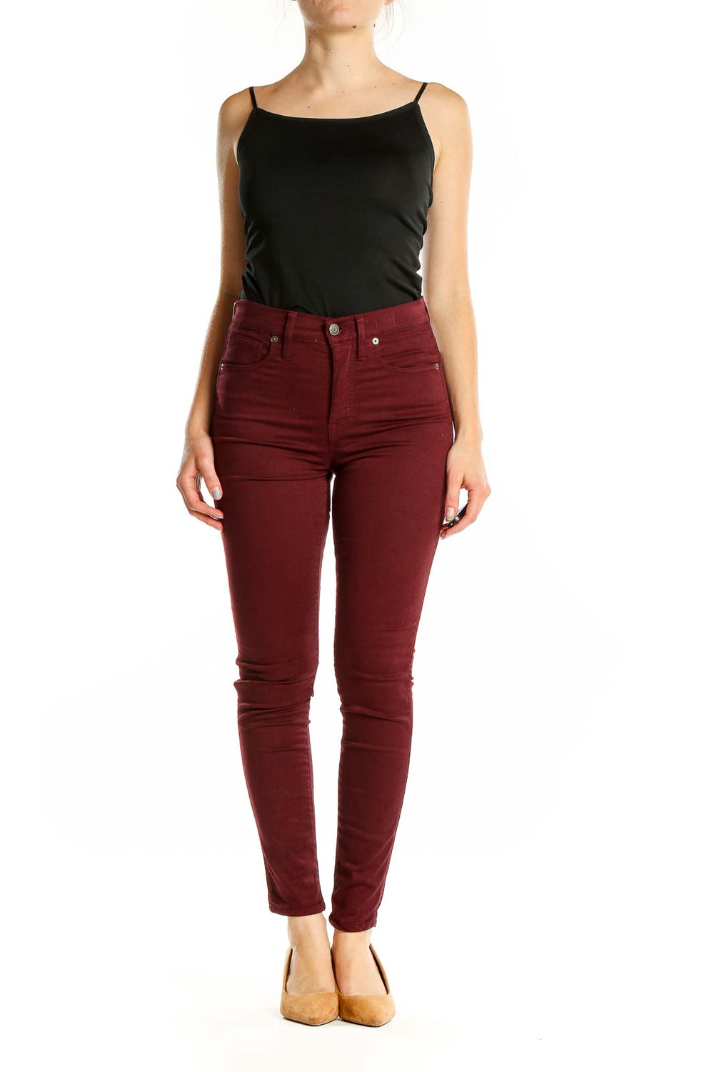 Front view of Madewell burgundy high-waisted skinny pants on model