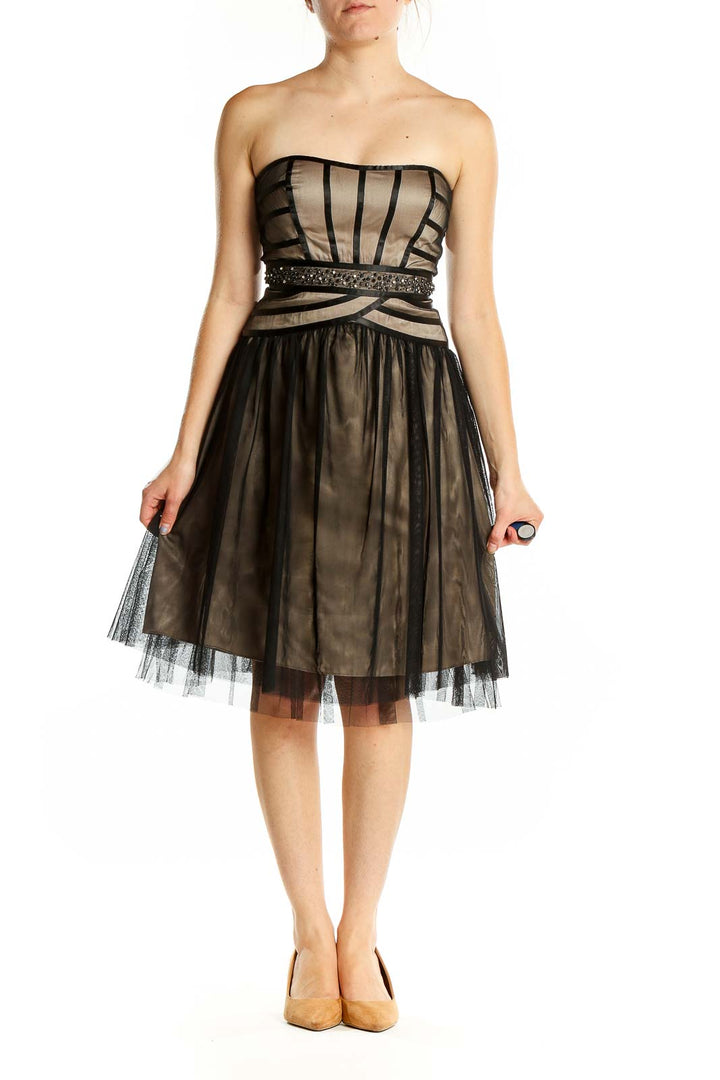 Front view of Max and Cleo black tulle strapless cocktail dress with beige underlay