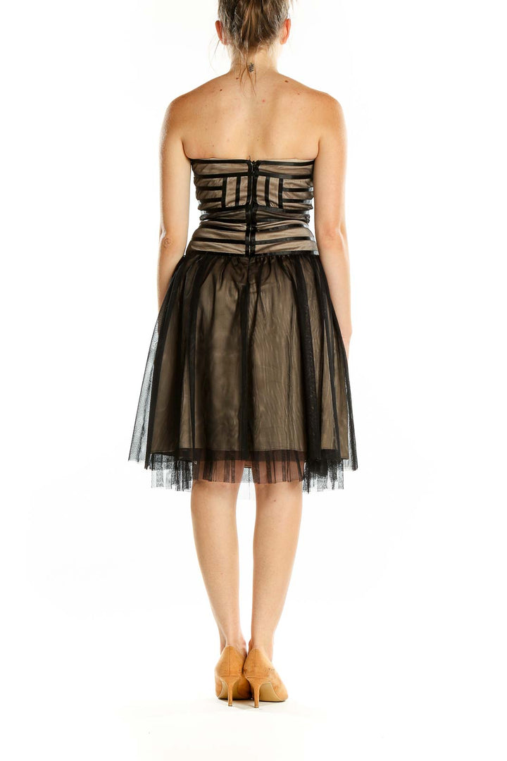 Back view of Max and Cleo black tulle strapless cocktail dress showing zipper closure