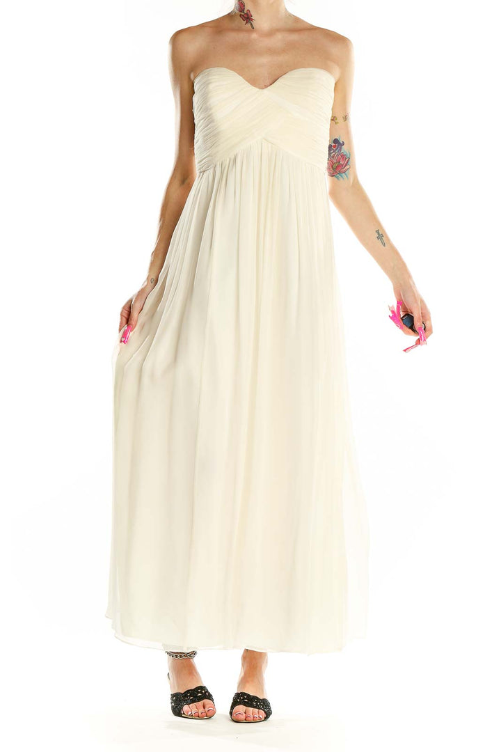Front view of Donna Morgan ivory strapless maxi dress with empire waist