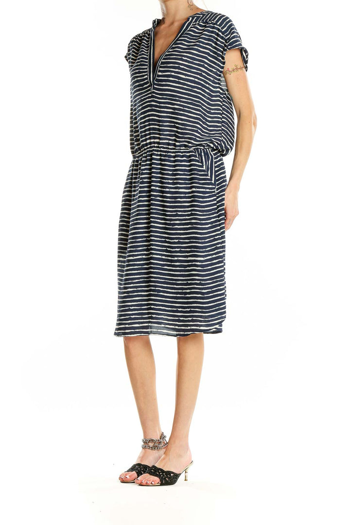 Front view of Banana Republic navy striped V-neck midi dress with cap sleeves