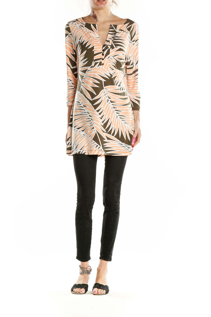 Front view of Tommy Bahama peach and olive palm leaf print tunic dress with V-neckline