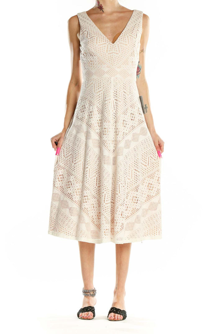 Front view of Vince Camuto cream lace midi dress with V-neckline