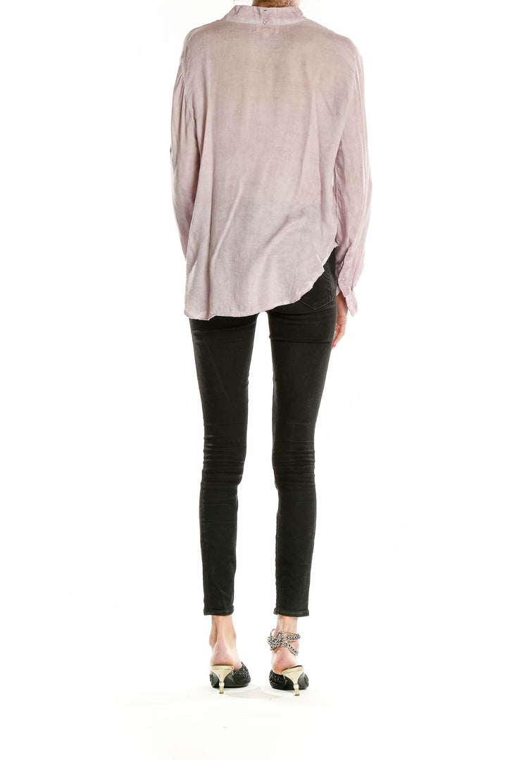 Back view of cloth & stone blush pink rayon button-up blouse with black jeans