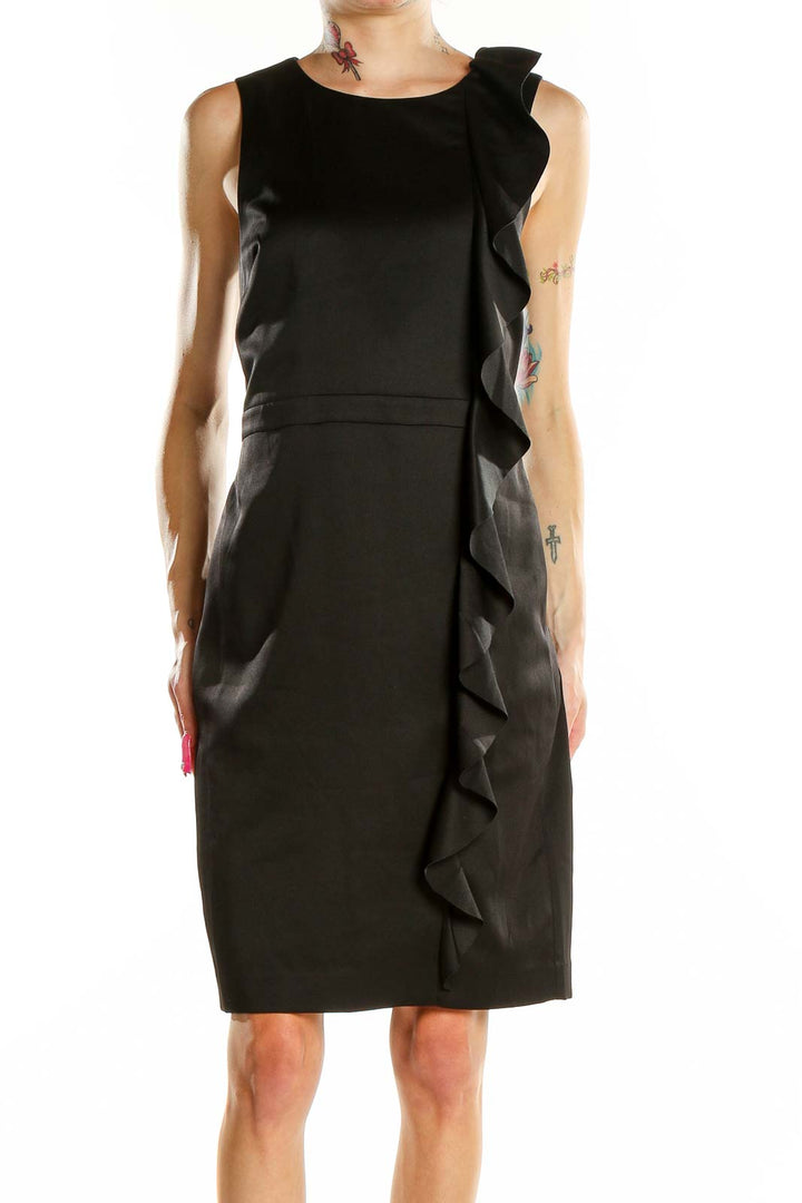 Front view of black Banana Republic sheath dress with side ruffle detail