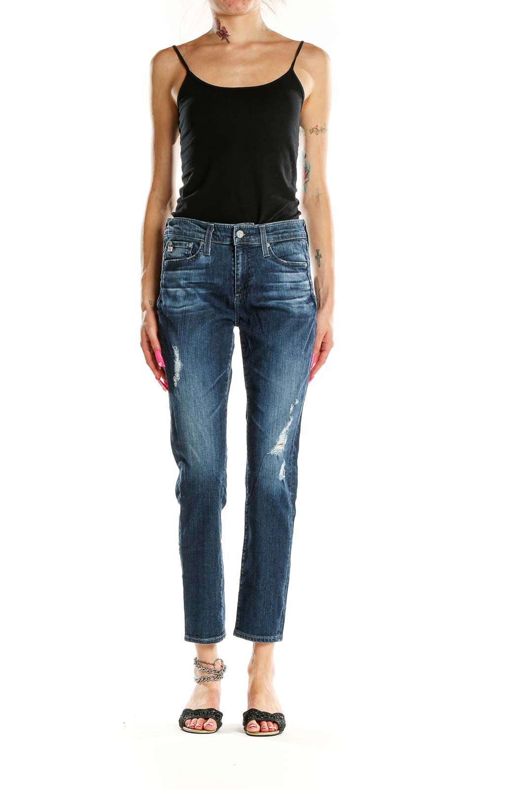 Front view of AG blue distressed slim fit jeans on model