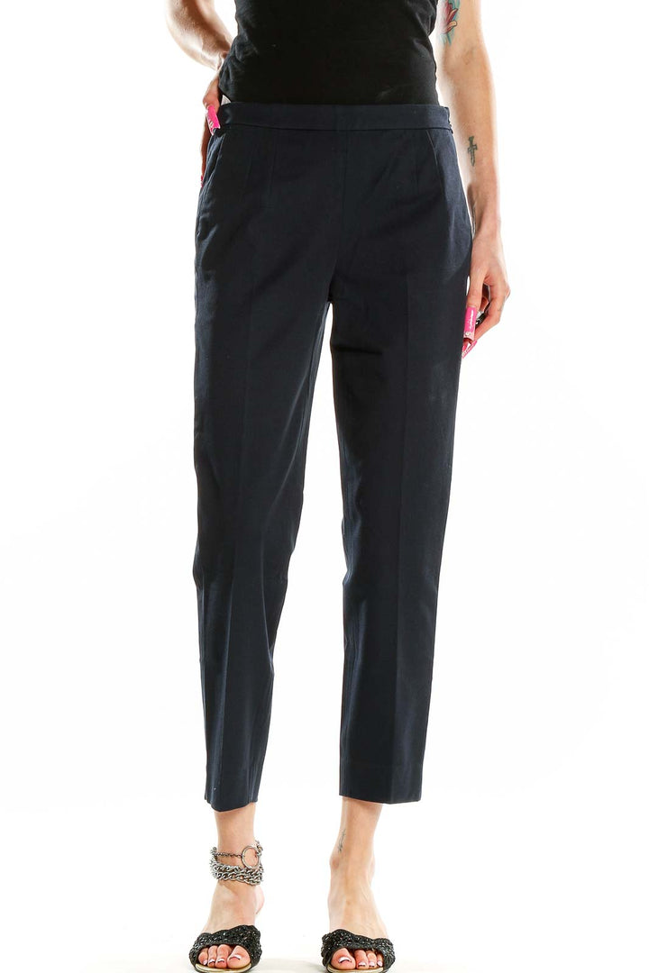 Front view of J.Crew navy cropped slim-fit trousers on model