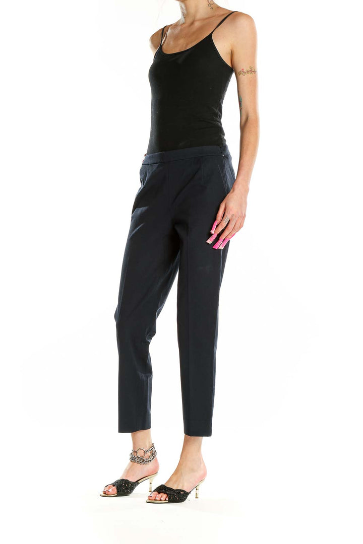 Front view of J.Crew navy cropped slim-fit trousers on model