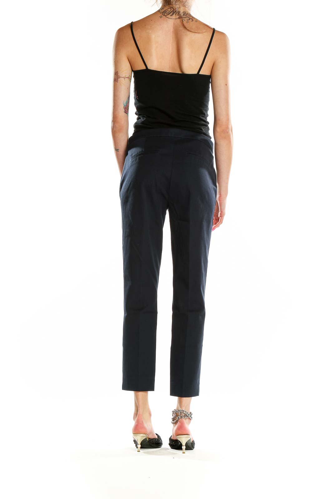 Side view of J.Crew navy cropped slim-fit trousers on model