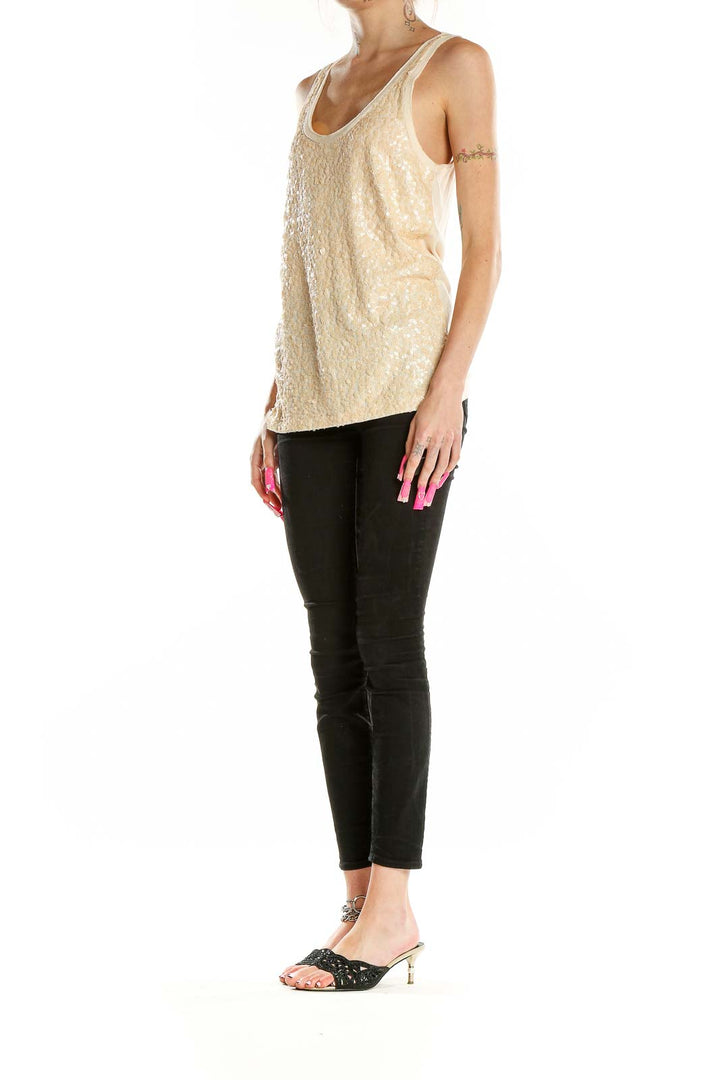 Front view of J.Crew cream sequined tank top on model