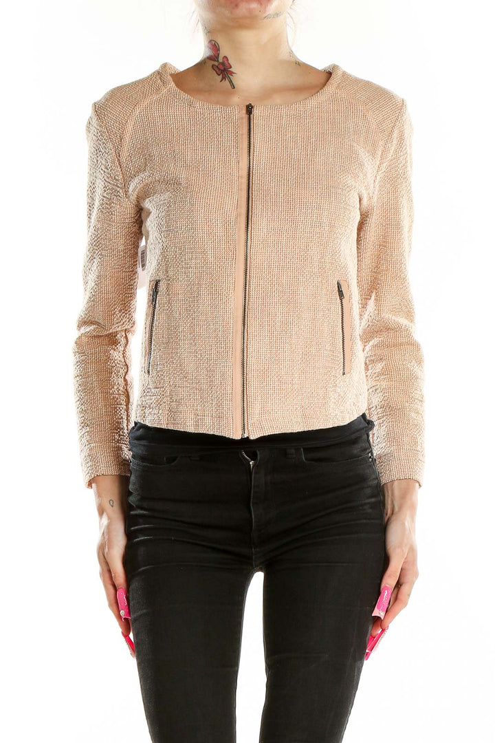 Front view of Humanoid blush textured zip-up cropped jacket