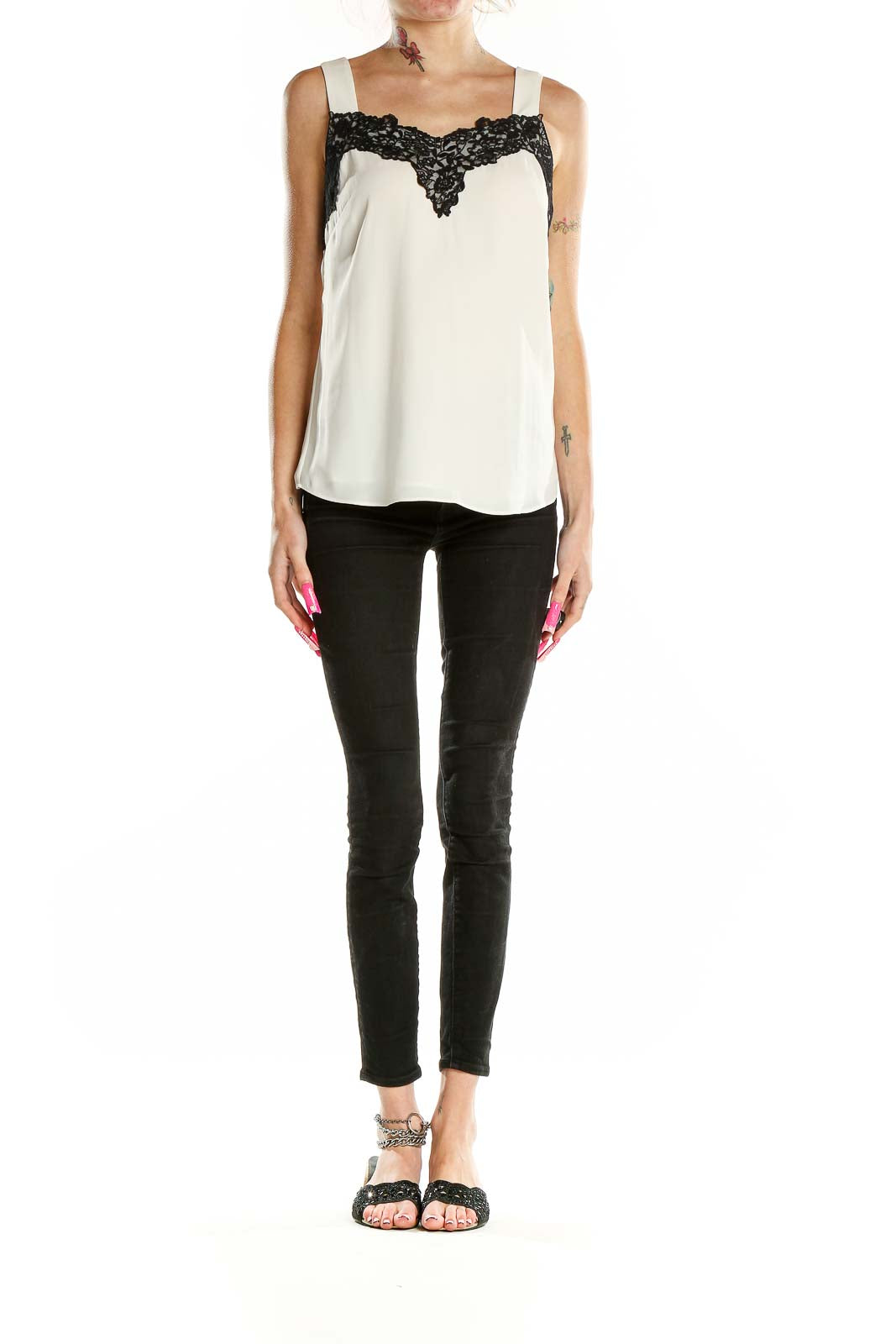 Front view of White House Black Market sleeveless blouse with black lace trim