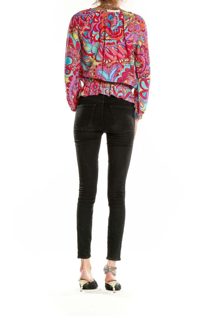 Back view of Lilly Pulitzer multicolor silk peasant blouse showing full pattern