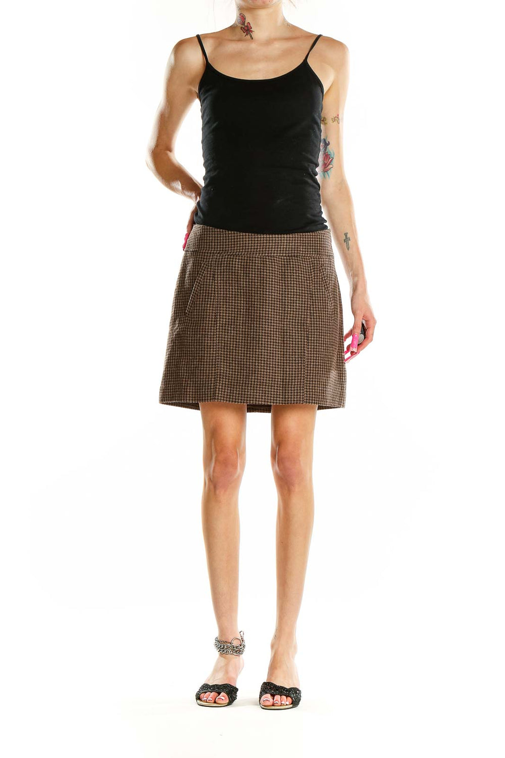 Front view of brown houndstooth mini skirt from The Limited