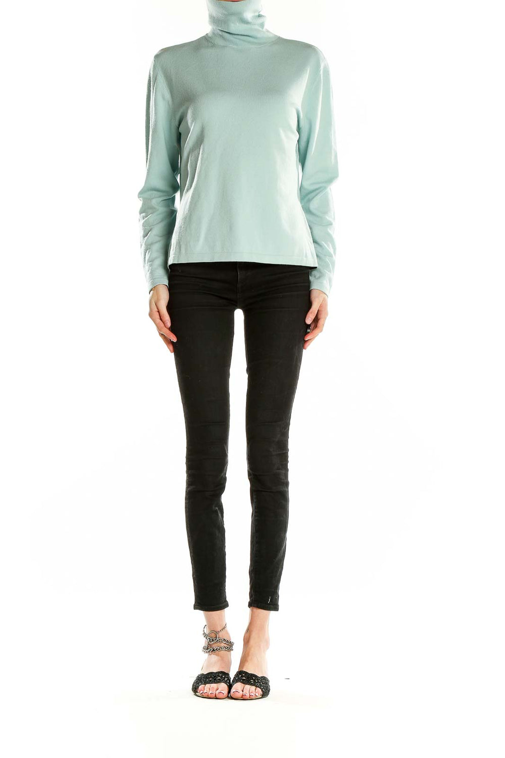 Front view of mint green Faconnable turtleneck sweater on model
