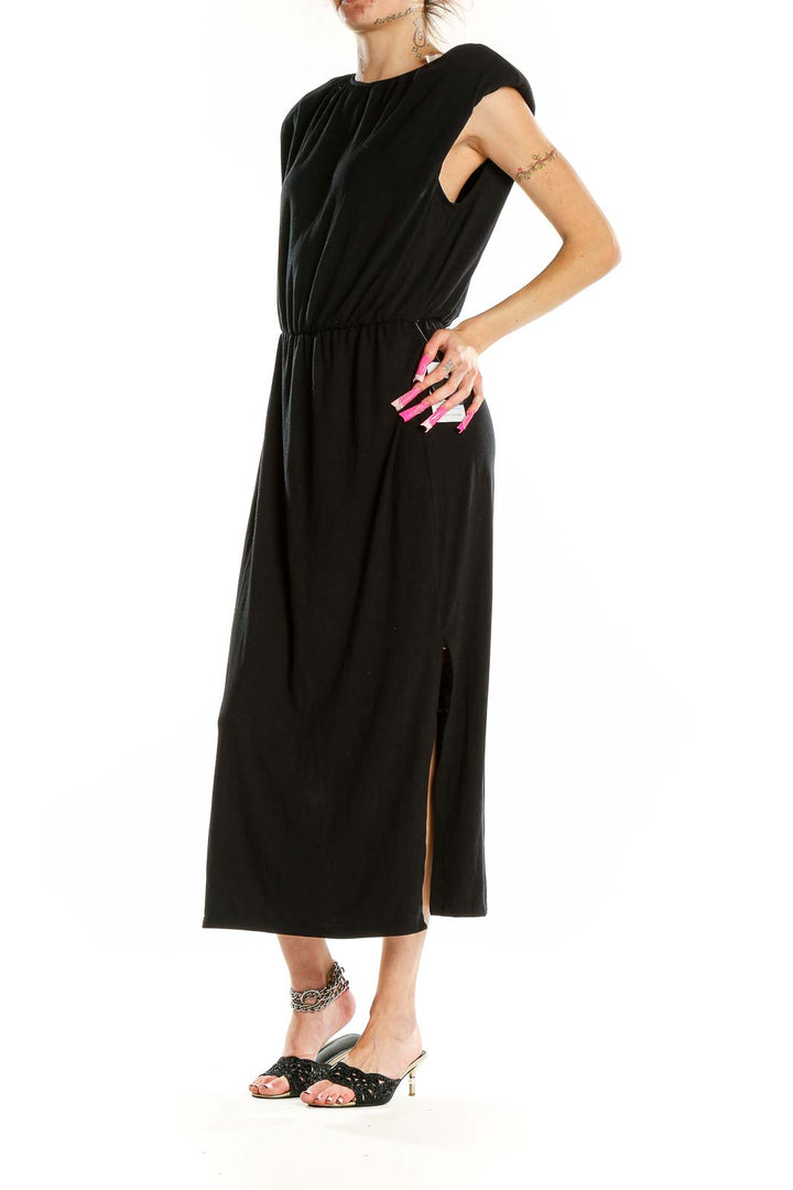 Front view of Wayf black maxi dress with boat neckline and cap sleeves