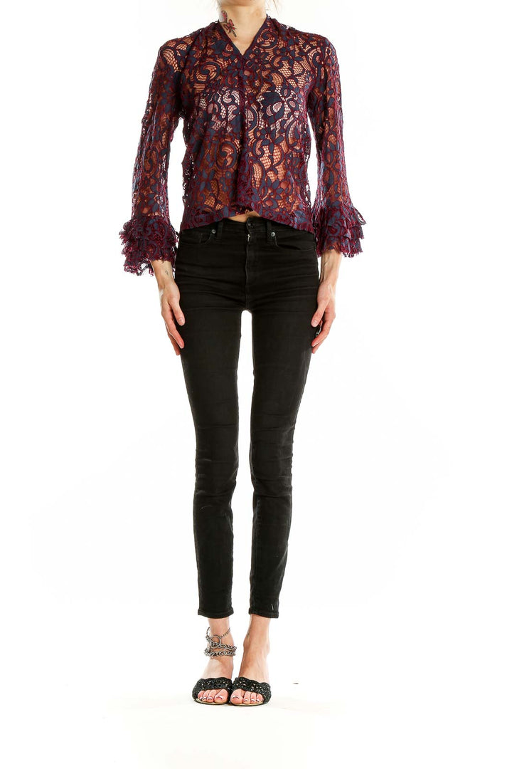 Front view of Willow & Clay burgundy lace crop top with bell sleeves