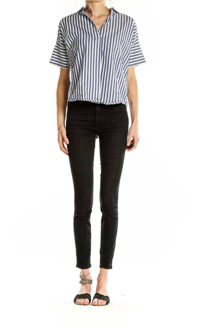Front view of Madewell blue and white striped short-sleeve button-up shirt