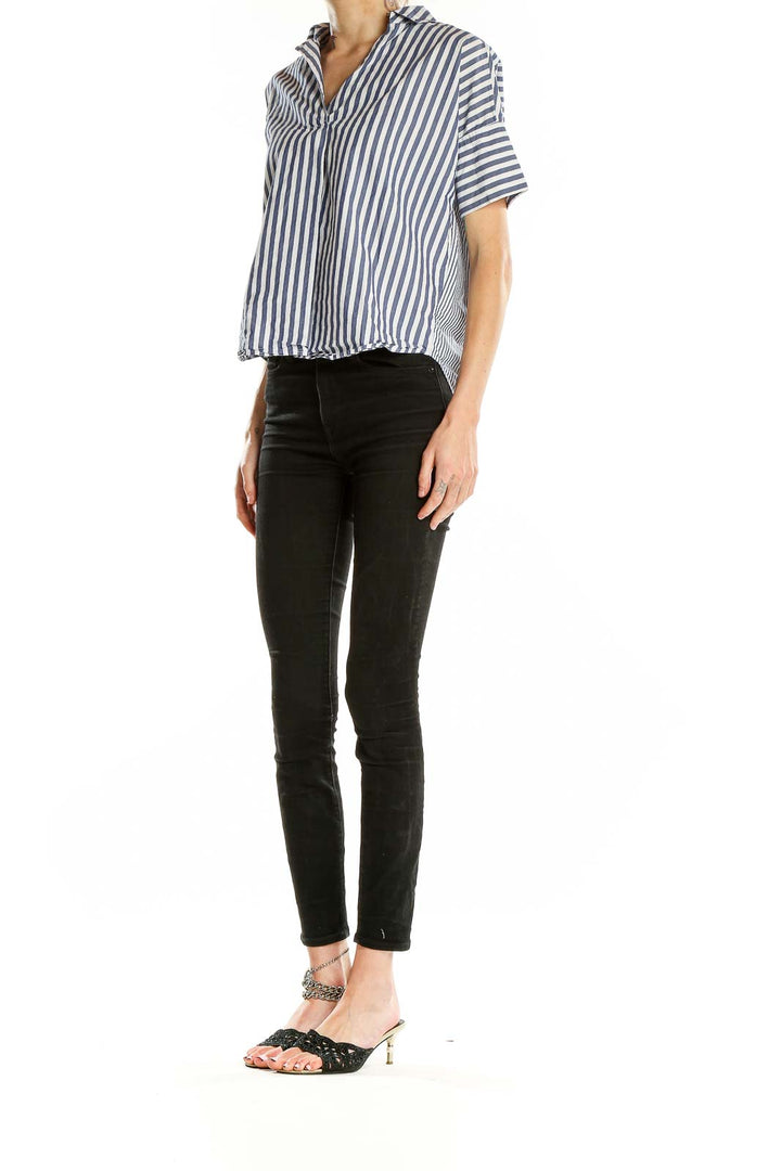 Front view of Madewell blue and white striped short-sleeve button-up shirt