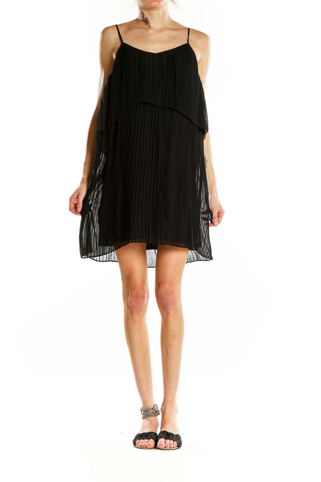 Front view of BCBGeneration black pleated chiffon mini dress with tiered design