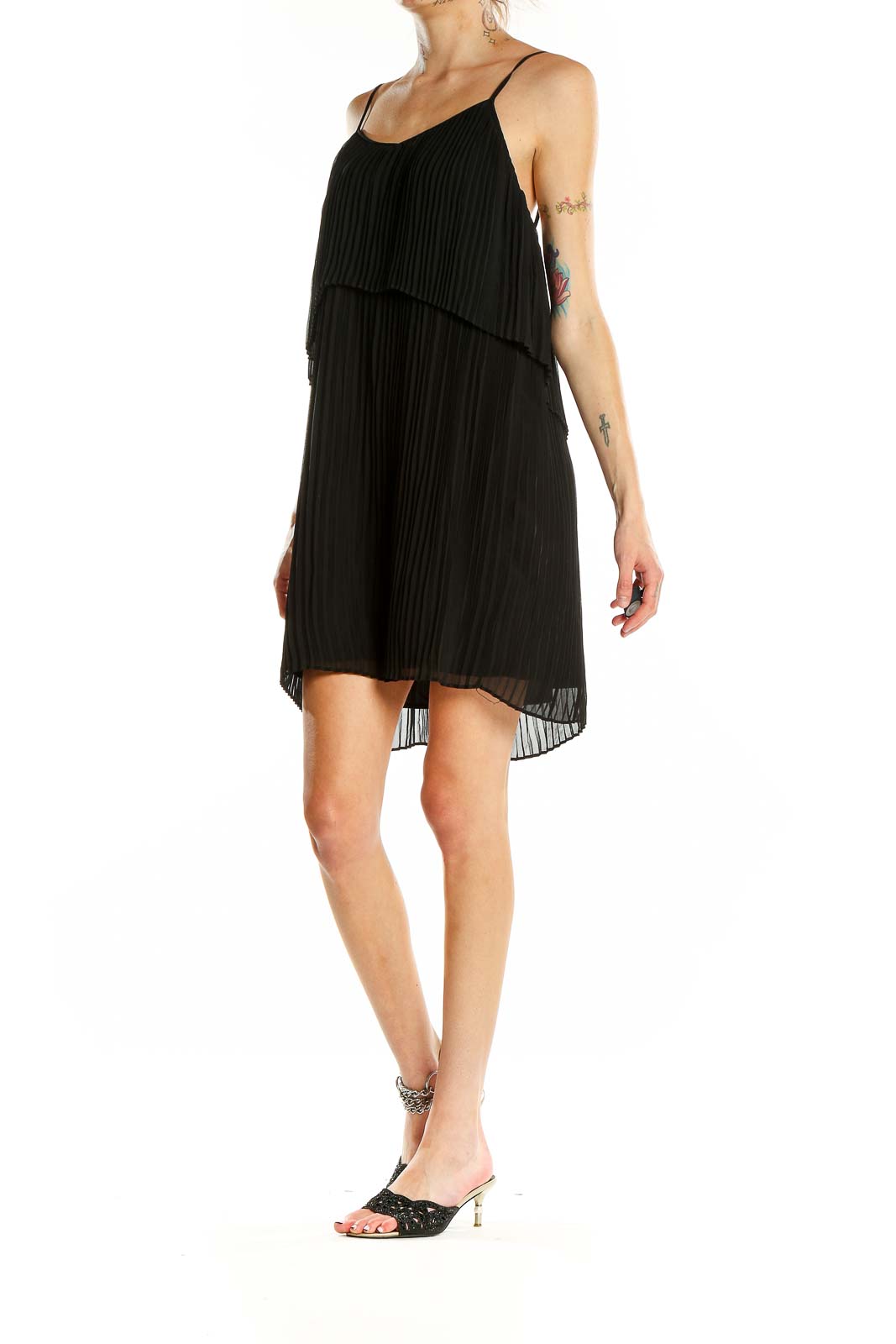 Front view of BCBGeneration black pleated chiffon mini dress with tiered design