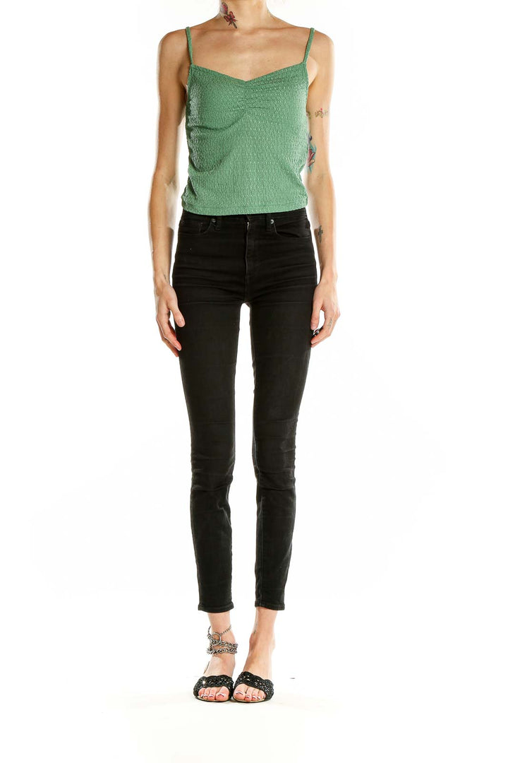 Front view of green textured cropped camisole top from Madewell