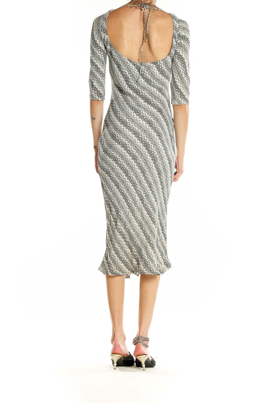 Side view of Tracy Reese gray striped rayon midi dress showing form-fitting silhouette