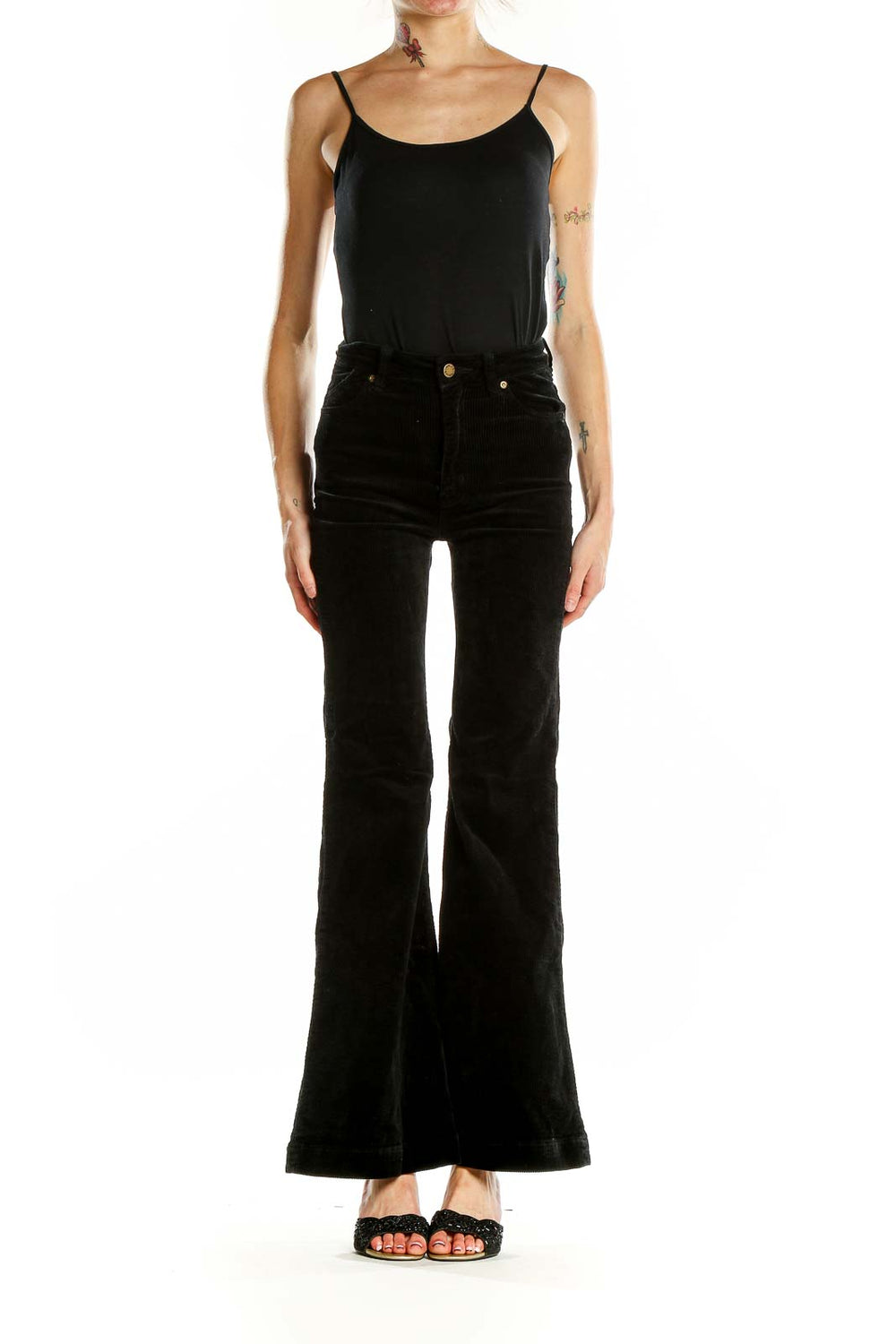 Front view of Rolla's black high-waisted flared jeans on model