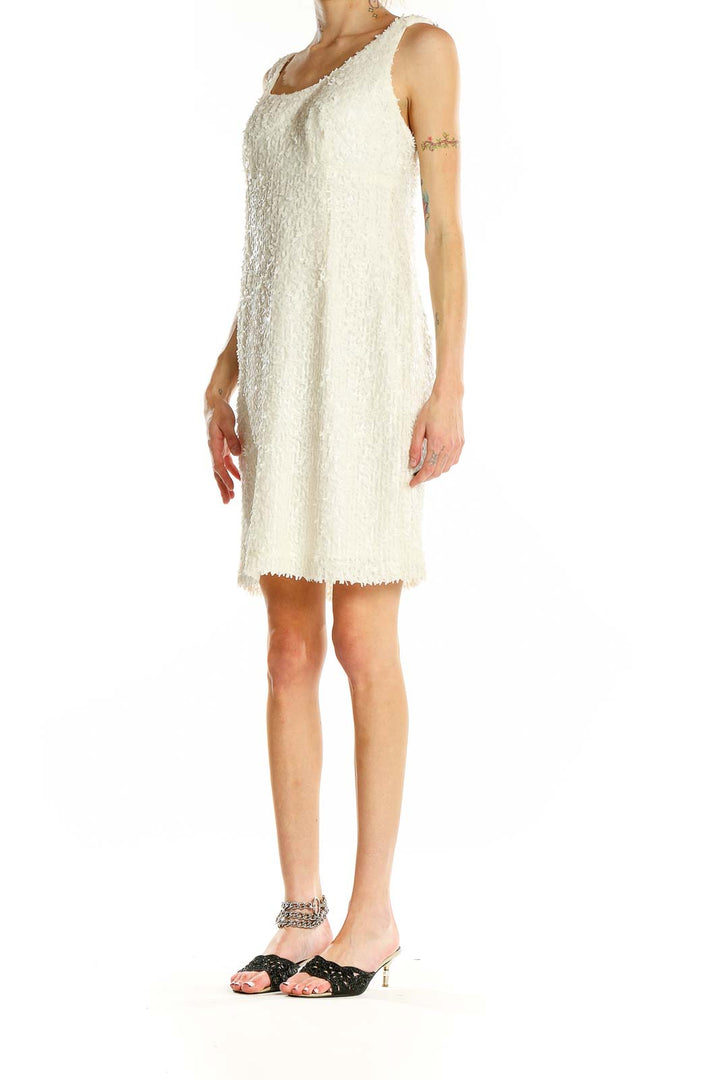 Front view of white textured sleeveless cocktail dress by Suzi Chin for Maggy Boutique