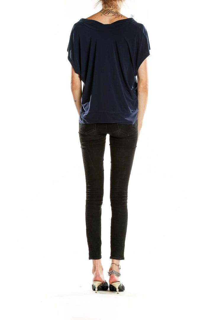 Side view of Navy Draped V-Neck Short Sleeve Top by Nine West on model