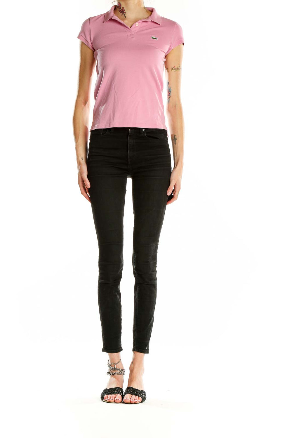 Front view of pink Lacoste polo shirt on model