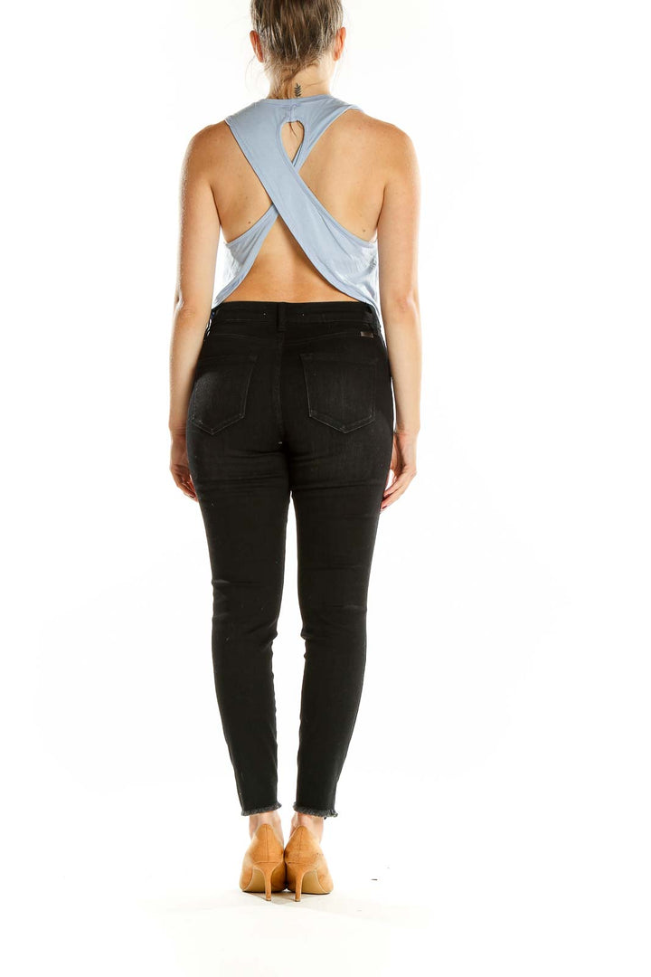 Back view of light blue Vitality cropped tank top showing cross-back design
