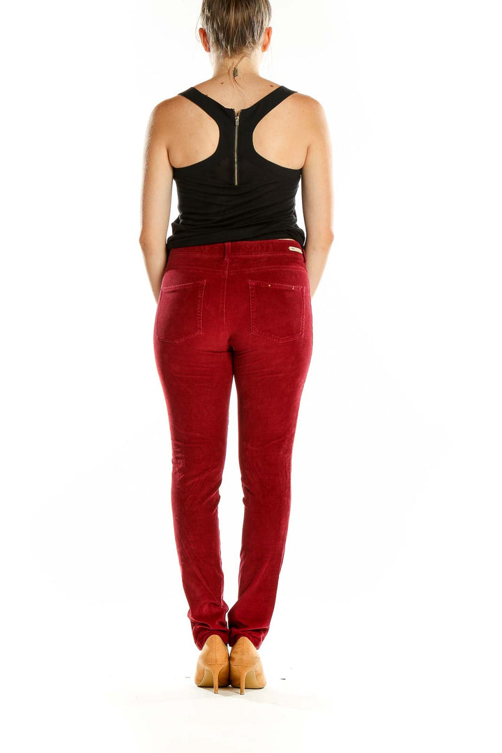 Back view of red corduroy slim fit pants by Pilcro and the Letterpress