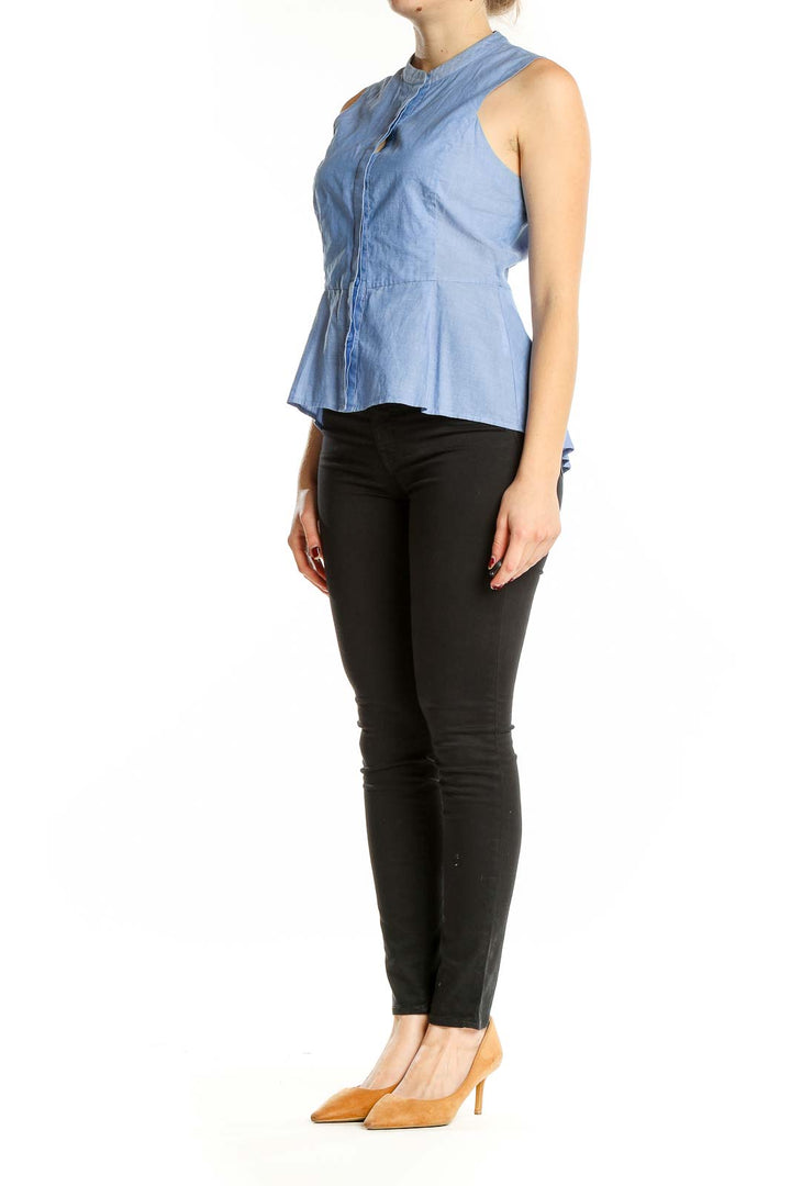 Front view of BCBG MaxAzria light blue sleeveless peplum top with mandarin collar