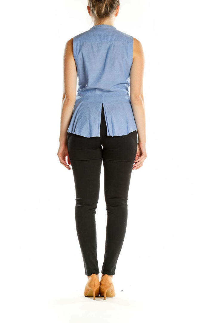 Back view of BCBG MaxAzria light blue sleeveless peplum top showing pleated detail