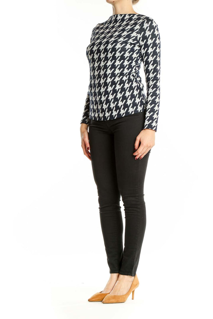Front view of Ann Taylor Navy and White Houndstooth Long Sleeve Top