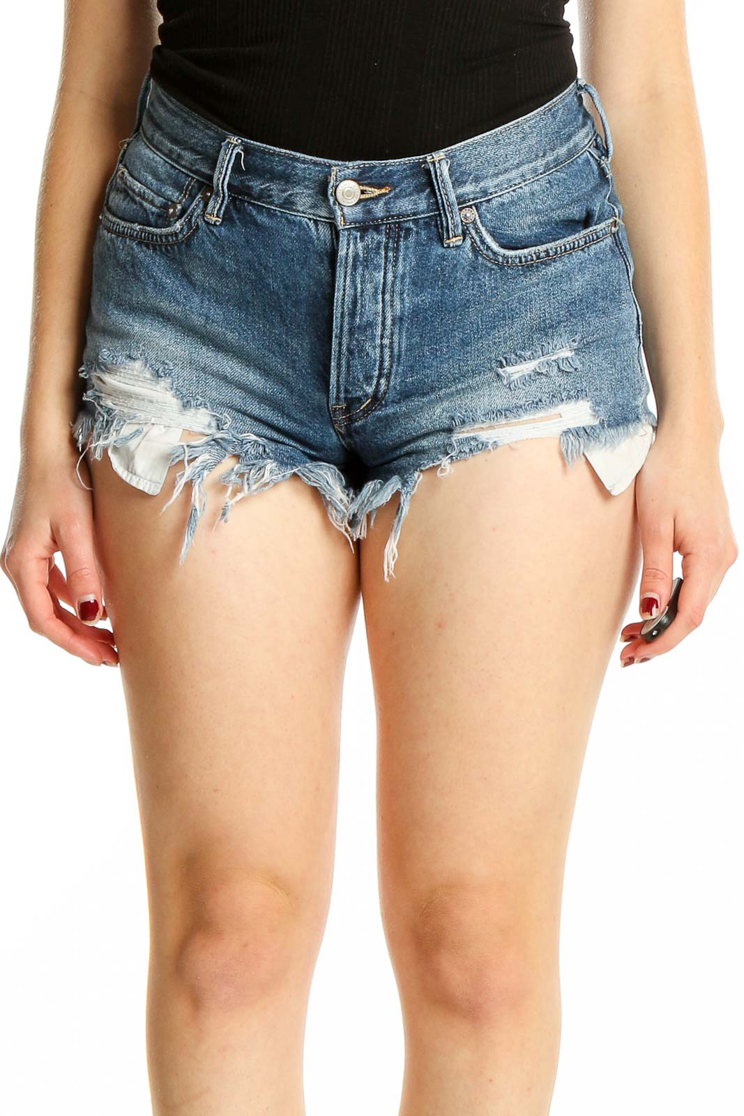 Front view of WE THE FREE blue distressed denim cutoff shorts