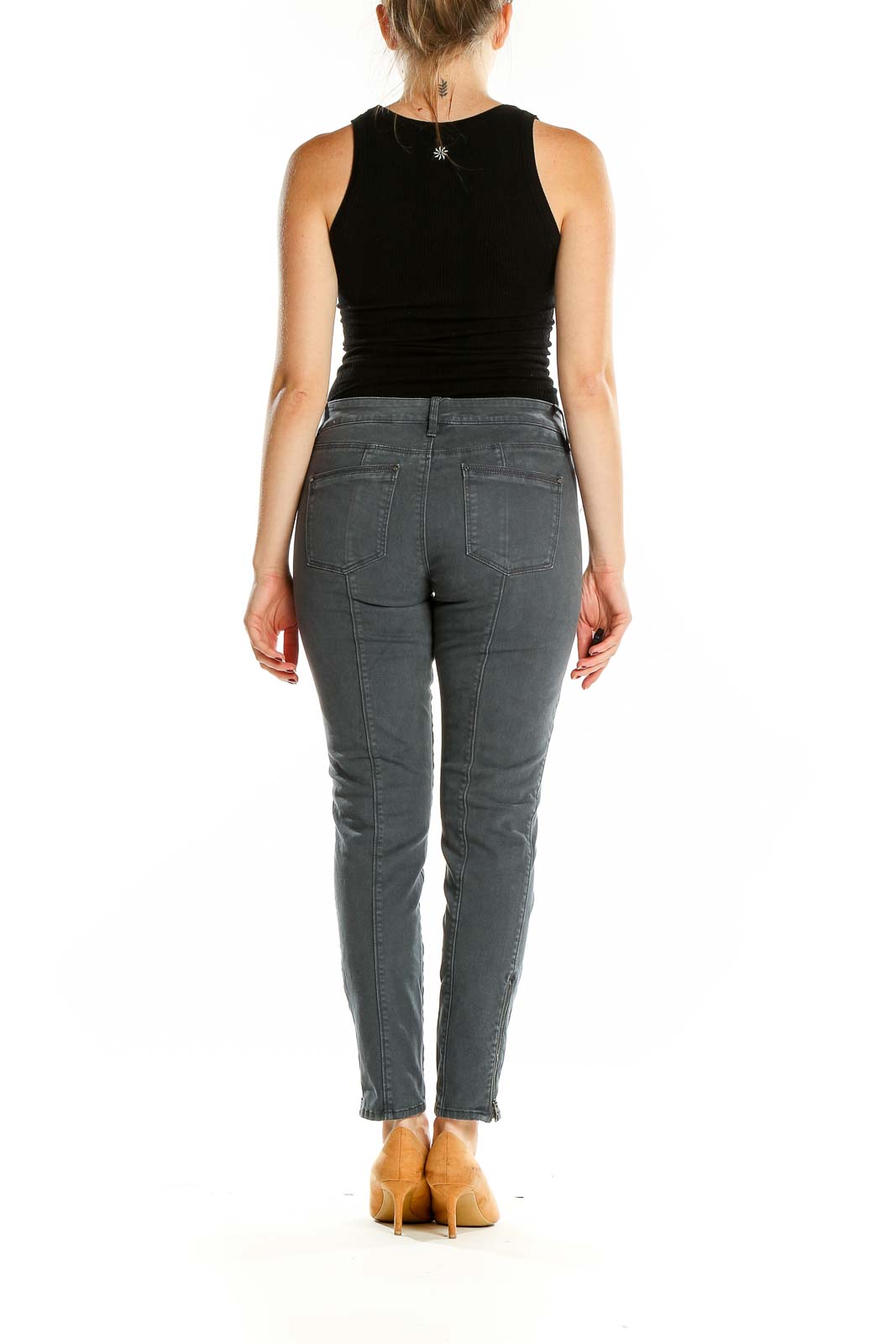 Back view of White House Black Market gray slim fit ankle jeans showing flattering fit