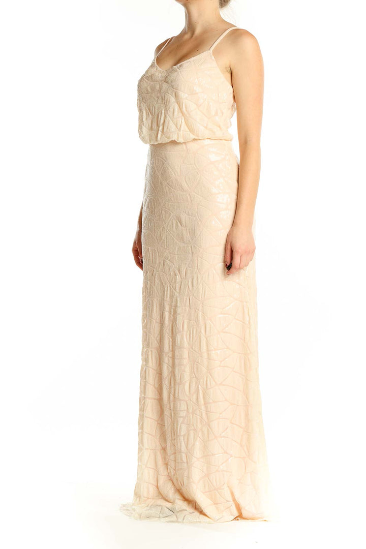 Front view of blush Slate & Willow sequin maxi dress with geometric pattern
