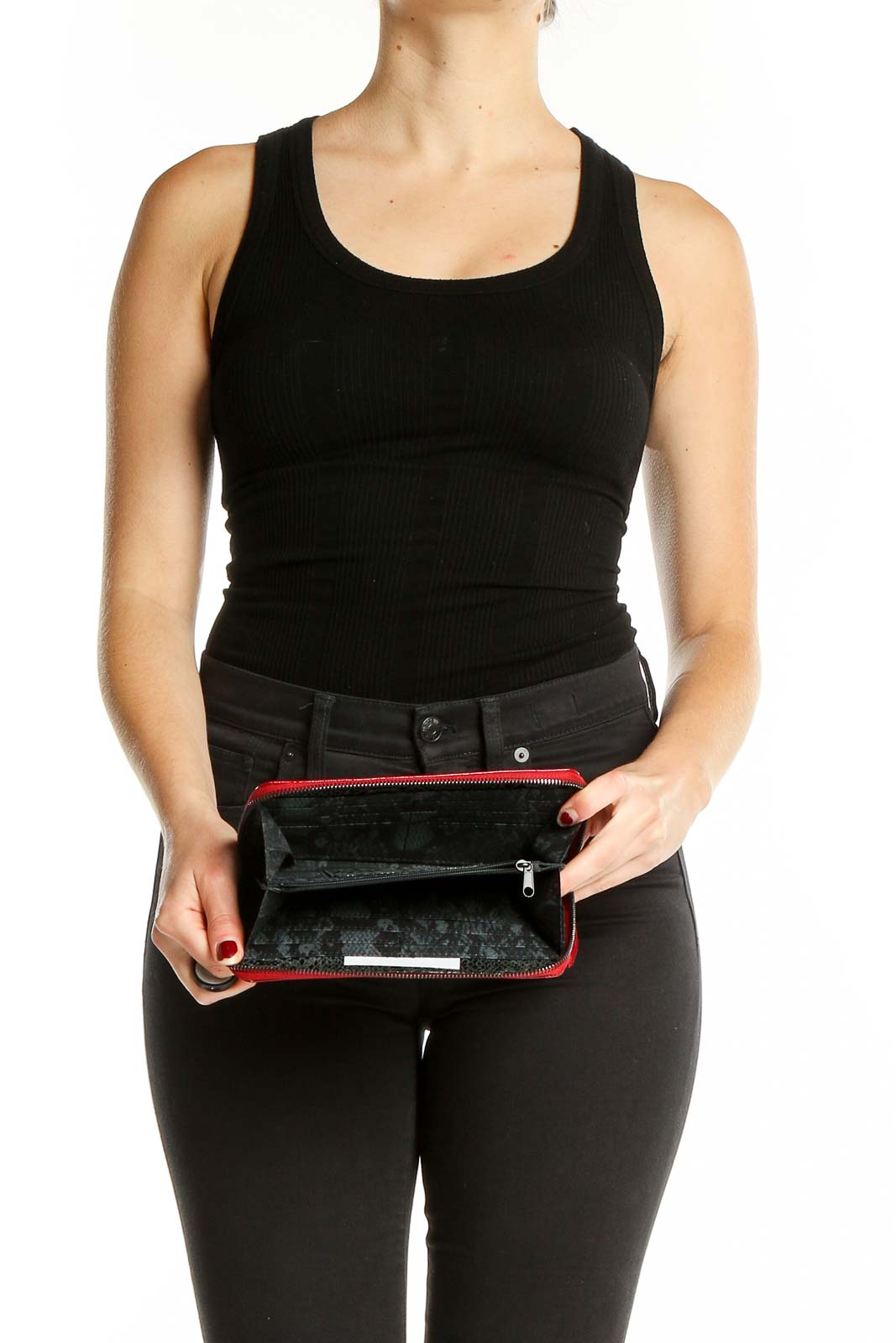 Kenneth Cole New York red patent leather clutch held open, showing interior