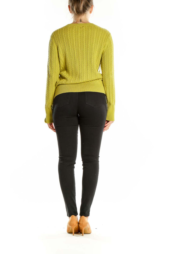 Back view of chartreuse Eddie Bauer cable knit cardigan showing cable pattern