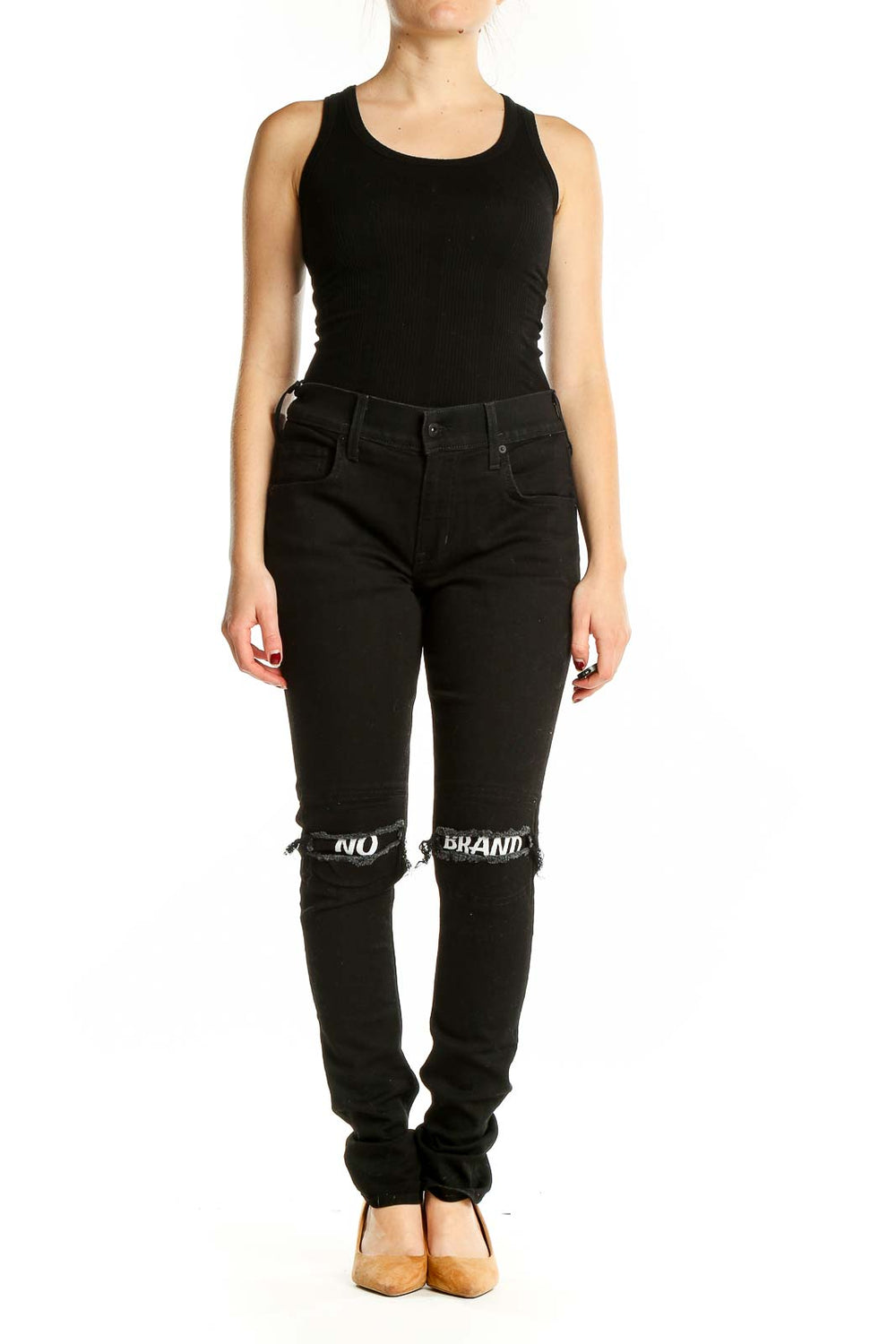 Front view of black distressed skinny jeans with 'NO BRAND' knee cutouts