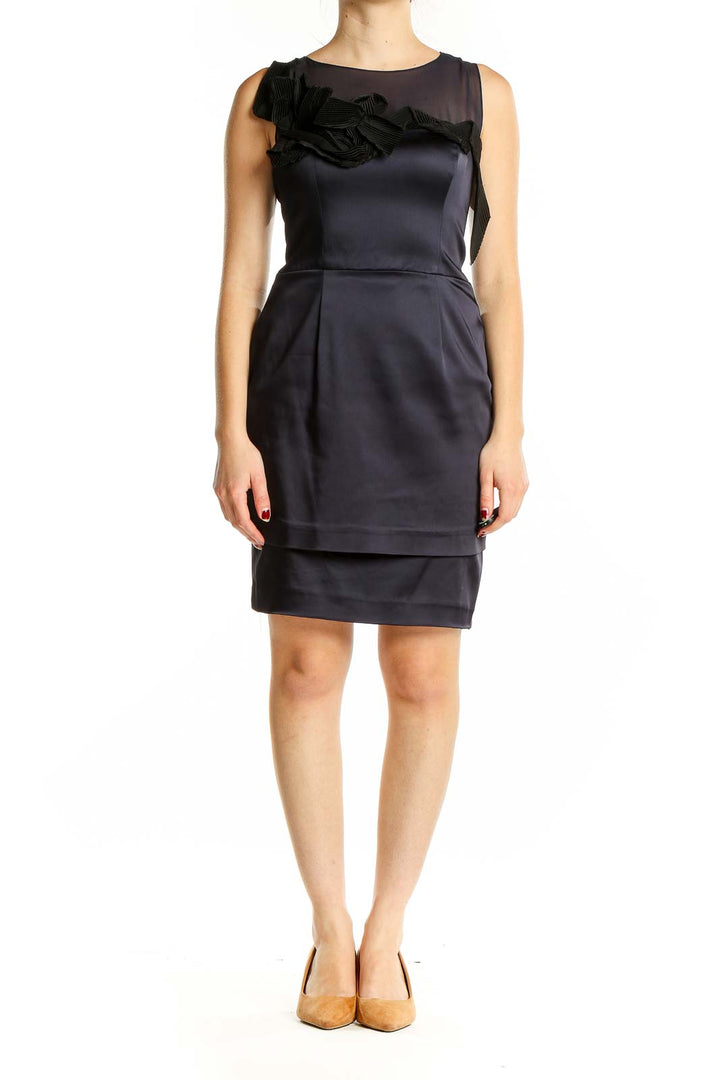 Front view of Taylor navy sleeveless cocktail dress with ruffle detail