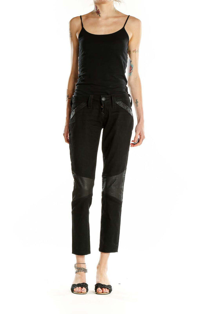 Front view of True Religion black cropped jeans with leather trim details