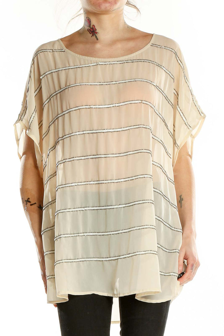 Front view of Lane Bryant beige striped oversized tunic top with metallic accents