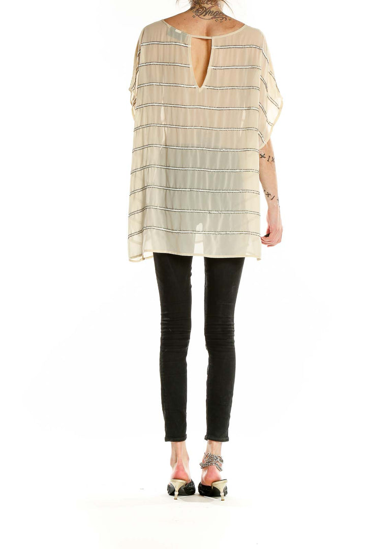 Back view of Lane Bryant beige striped oversized tunic top showing keyhole detail
