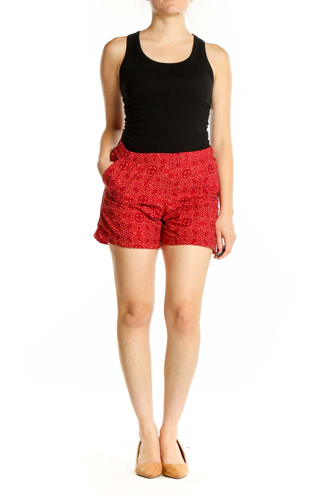 Front view of red patterned Columbia shorts with side pockets