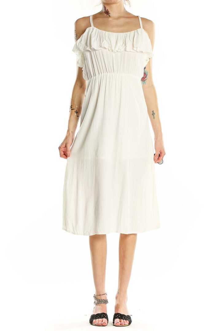 Front view of white Leith midi sundress with ruffled neckline and spaghetti straps